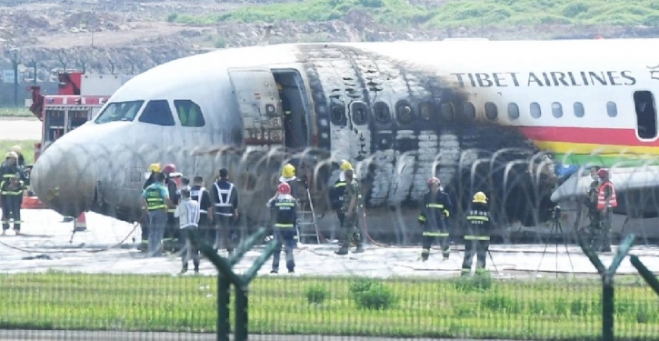 Plane catches fire during takeoff in China
