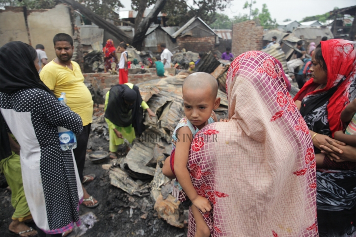 In Pictures: Fire at Sat Tala slum