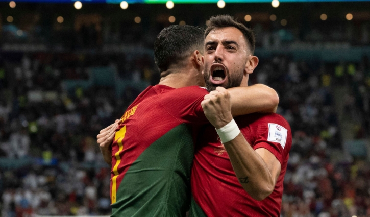 Fernandes brace takes Portugal to last 16