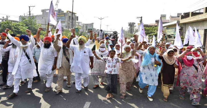 Indian farm laws: Farmers end protest after govt accepts demands