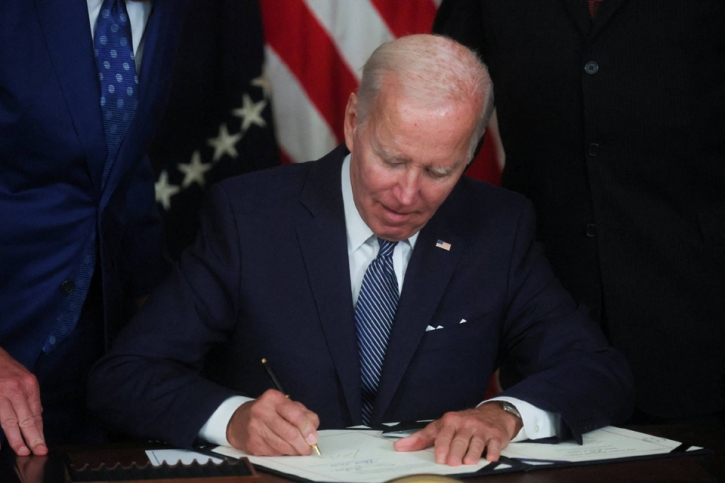 Biden signs major climate change, health care law