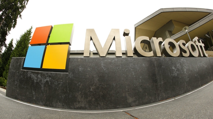 Microsoft, amid layoffs, says quarterly profit drops 12%