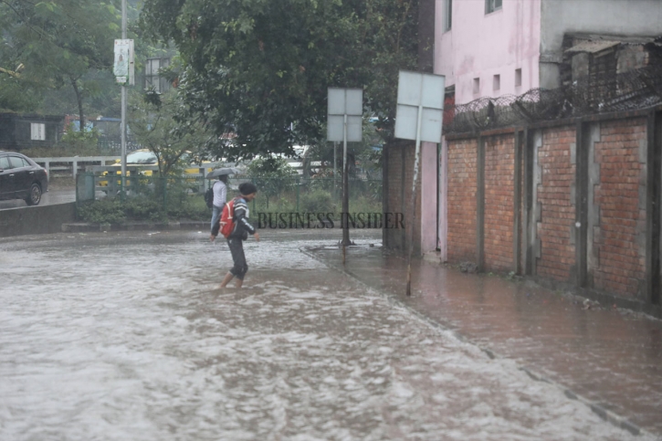 In Pictures: Rain brings miseries to city dwellers