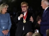 Elton John was moved to tears by a surprise award from President Biden