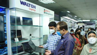 ICT Secretary visits Walton factory, launches new model of laptop