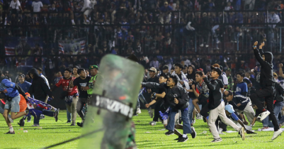 174 died after fans stampede to exit Indonesian soccer match