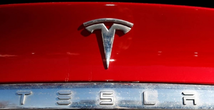 Tesla sued over mass termination