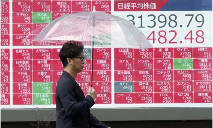 Asian markets mostly higher after Biden-McCarthy deal on US debt