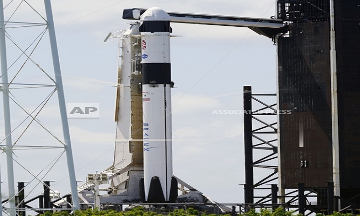 Launch of 4 astronauts to space station bumped to Saturday Launch of 4 astronauts to space station bumped to Saturday