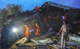 Indian officials end rescue work for 2 wrecked passenger trains that killed over 300 people
