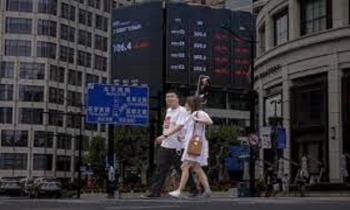 Asian markets struggle as traders prepare for higher rates