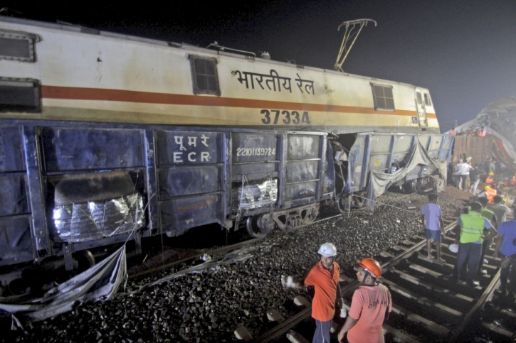 Over 230 killed and 900 hurt after 2 trains derail in India, hundreds still trapped in coaches Over 230 killed and 900 hurt after 2 trains derail in India, hundreds still trapped in coaches