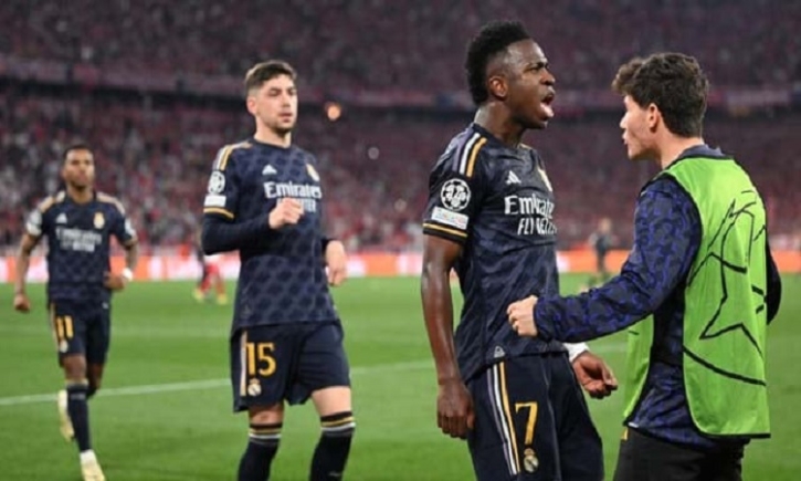 Vinicius hits two as Real Madrid eye final after snatching draw at Bayern