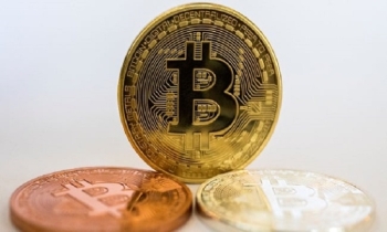 Bitcoin tops $60,000, approaches all-time high