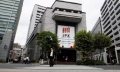 Asian markets swing ahead of US jobs, Tokyo hit by strong yen