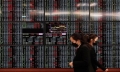 Asian shares muted ahead of Fed comments
