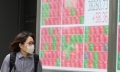Asian traders bide their time ahead of key US inflation data