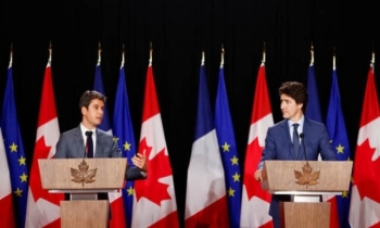 French PM, Trudeau defend Canada-EU trade pact