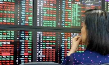 Asian markets mixed as traders weigh US rate outlook